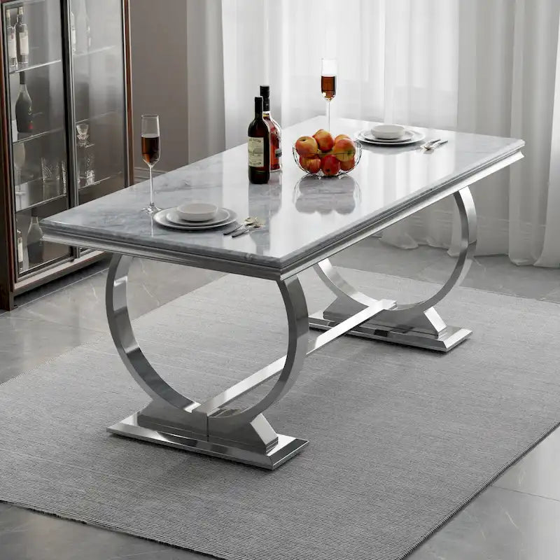 Table de salle à manger de luxe avec piètement circulaire en métal poli - 183 cm